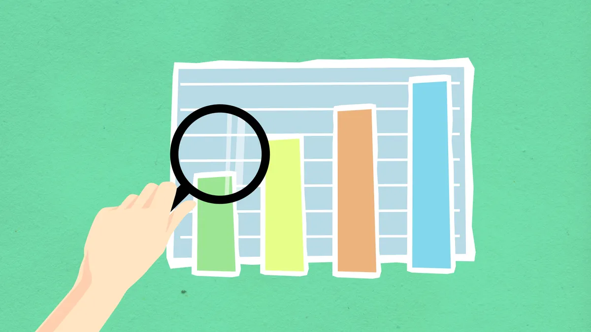 Magnifying glass over a bar chart